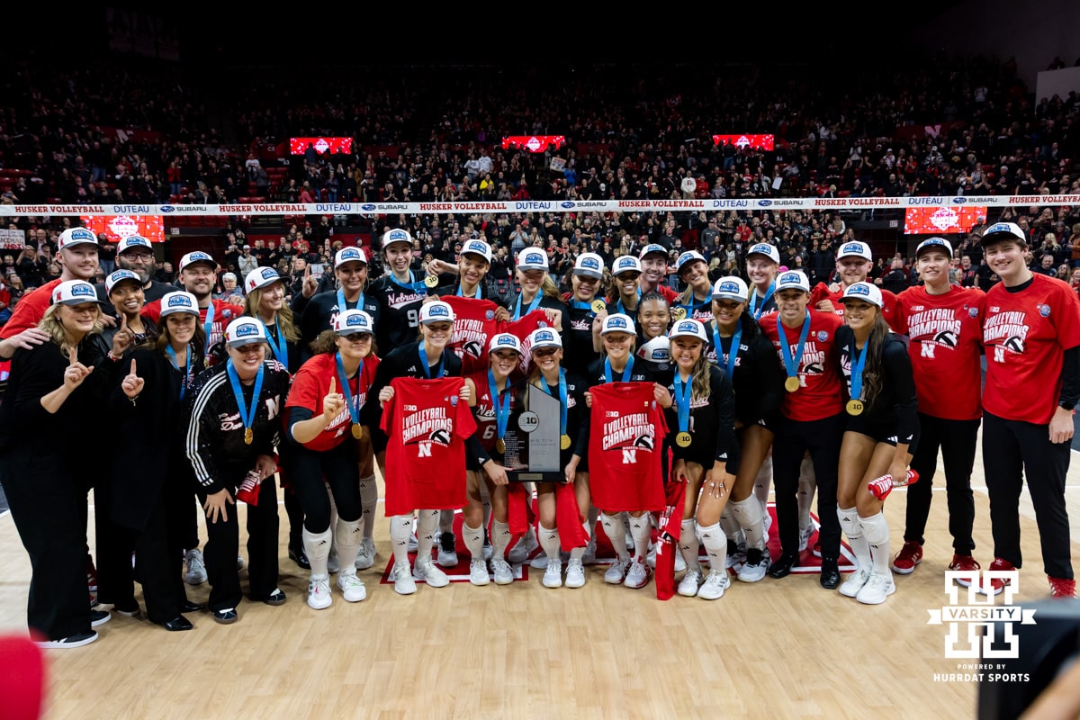 Nebraska Cornhuskers pose for a photo celebrating the Big Ten Championship after the volleyball match against the Penn State Nittany Lions on Friday, Nov. 28, 2025, in Lincoln, Nebraska. Photo by John S. Peterson.