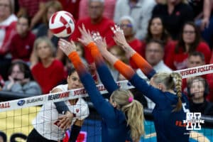 Nebraska Cornhusker outside hitter Skyler Pierce (21) spikes the ball against the Illinois Fighting Illini in the third during a college volleyball match on Thursday, November 6, 2025, in Lincoln, Nebraska. Photo by John S. Peterson.