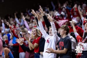 Nebraska Cornhusker fans celebrates a three point shot against the Oklahoma Sooners in the second half during a college men’s basketball game on Saturday, Nov 15, 2025, in Sioux Falls, South Dakota. Photo by John S. Peterson.