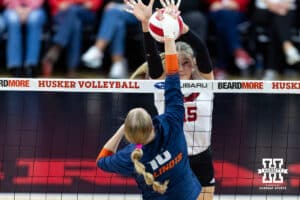 Nebraska Cornhusker middle blocker Andi Jackson (15) blocks the ball against Illinois Fighting Illini middle blocker Ashlyn Philpot (16) in the third set during a college volleyball match on Thursday, November 6, 2025, in Lincoln, Nebraska. Photo by John S. Peterson.