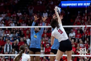 Nebraska Cornhusker opposite Virginia Adriano (9) gets a kill against the LIU Sharks in the first set during the first round of the NCAA volleyball tournament on Friday, Dec. 5, 2025, in Lincoln, Nebraska. Photo by John S. Peterson.