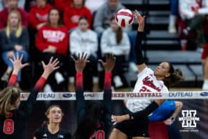 Nebraska Cornhusker outside hitter Harper Murray (27) spikes the ball against the Ohio State Buckeyes during a volleyball match on Saturday, Nov. 29, 2025, in Lincoln, Nebraska. Photo by John S. Peterson.