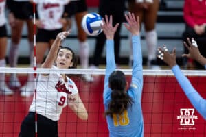 Nebraska Cornhusker opposite Virginia Adriano (9) spikes the ball against LIU Shark outside hitter Sara van Gisteren (18) in the second set during the first round of the NCAA volleyball tournament on Friday, Dec. 5, 2025, in Lincoln, Nebraska. Photo by John S. Peterson.