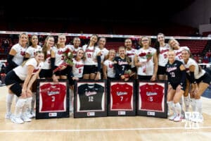 Nebraska Cornhusker seniors Allie Sczech, Taylor Landfair, Maisie Boesiger, and Rebekah Allick pose for a photo with their teammates for senior day after a win over the Ohio State Buckeyes on Saturday, Nov. 29, 2025, in Lincoln, Nebraska. Photo by John S. Peterson.
