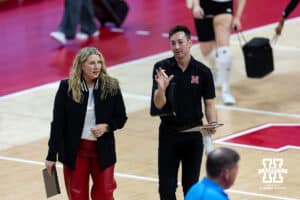 Nebraska Cornhusker head coach Dani Busboom Kelly and assistant Brennan Hagar head to the locker room after the second set against the LIU Sharks during the first round of the NCAA volleyball tournament on Friday, Dec. 5, 2025, in Lincoln, Nebraska. Photo by John S. Peterson.