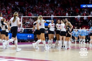 Nebraska Cornhuskers celebrate match point in the third set against the LIU Sharks during the first round of the NCAA volleyball tournament on Friday, Dec. 5, 2025, in Lincoln, Nebraska. Photo by John S. Peterson.